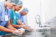 Surgeons washing hands