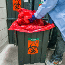 hospital worker handling hazardous waste
