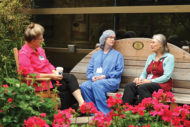 Nurses in hospital garden