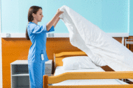 ES worker making bed