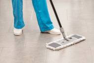 EVS tech mopping hospital floor