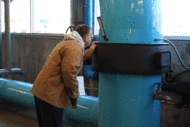 Man inspecting chilled water plant