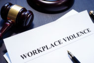 Document with Workplace Violence on header next to gavel