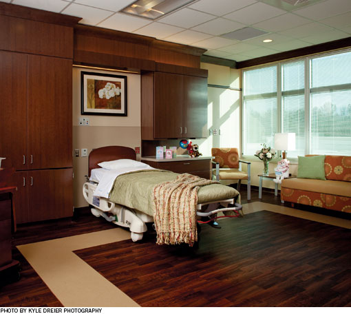 Laminate panels, designed with input from hospital staff, improve the look and functionality of the headwall in the patient rooms.
