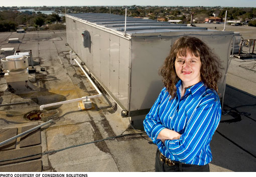 Elena Ress, an engineer with ConEdison Solutions, on the roof of Largo (Fla.) Medical Center, where the company provided energy services.