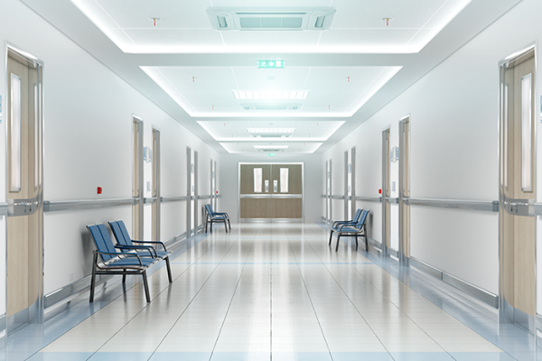 Hospital hallway with chairs along the wall