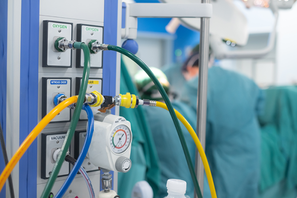 Flexible medical gas tubing connected to patient headwall