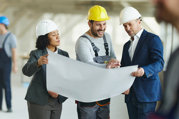 Architects discussing building plans