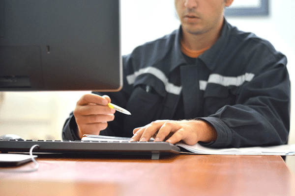 maintenance person watching webinar