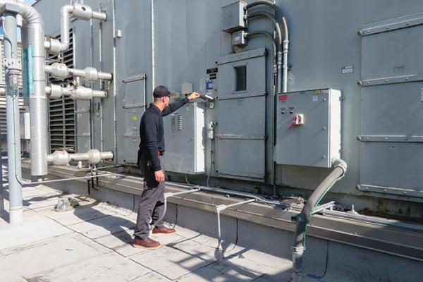 Employee performing maintenance