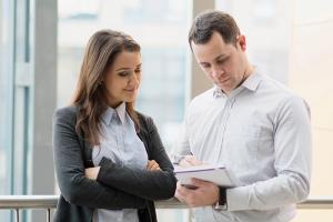 Colleagues review documentation