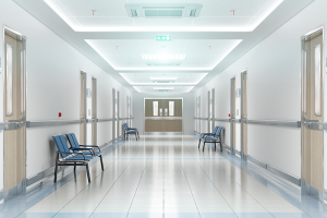 Hospital hallway with chairs along the wall