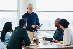 Three colleagues in meeting