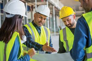 Construction professionals looking at construction professionals