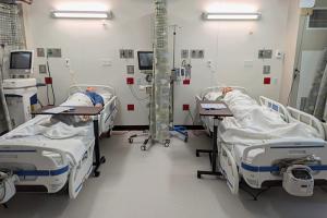 patient beds and hallways in alternate care conversion facility