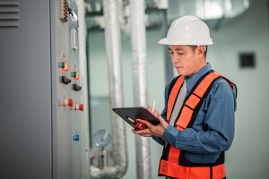 Engineer inspecting equipment