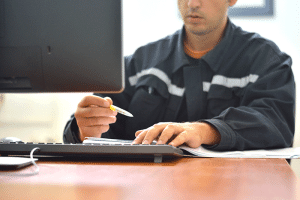 maintenance person watching webinar