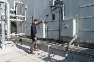 Employee performing maintenance